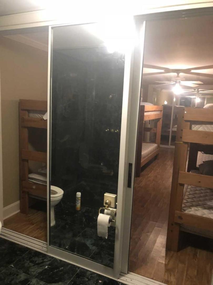 a shower in a bathroom aboard LAKEHOUSE Yacht for Sale