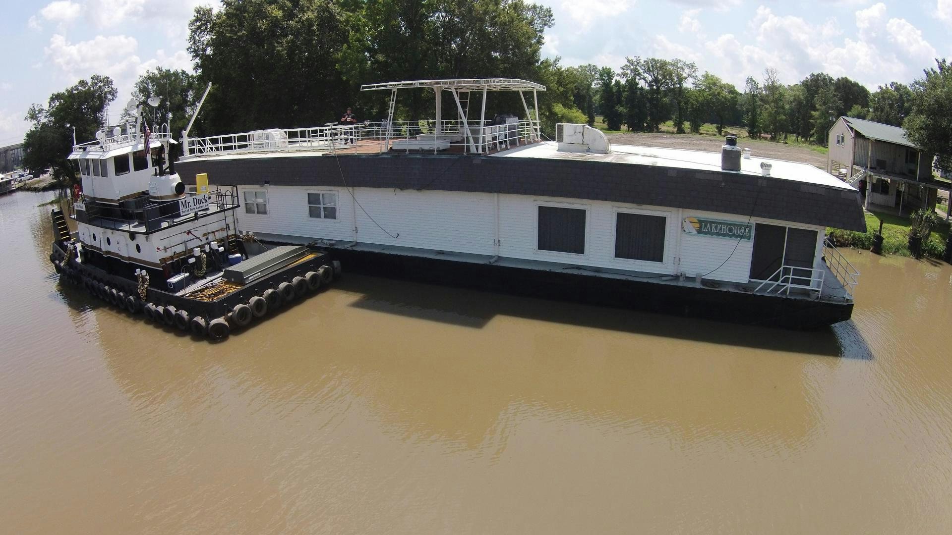 a boat on the water aboard LAKEHOUSE Yacht for Sale