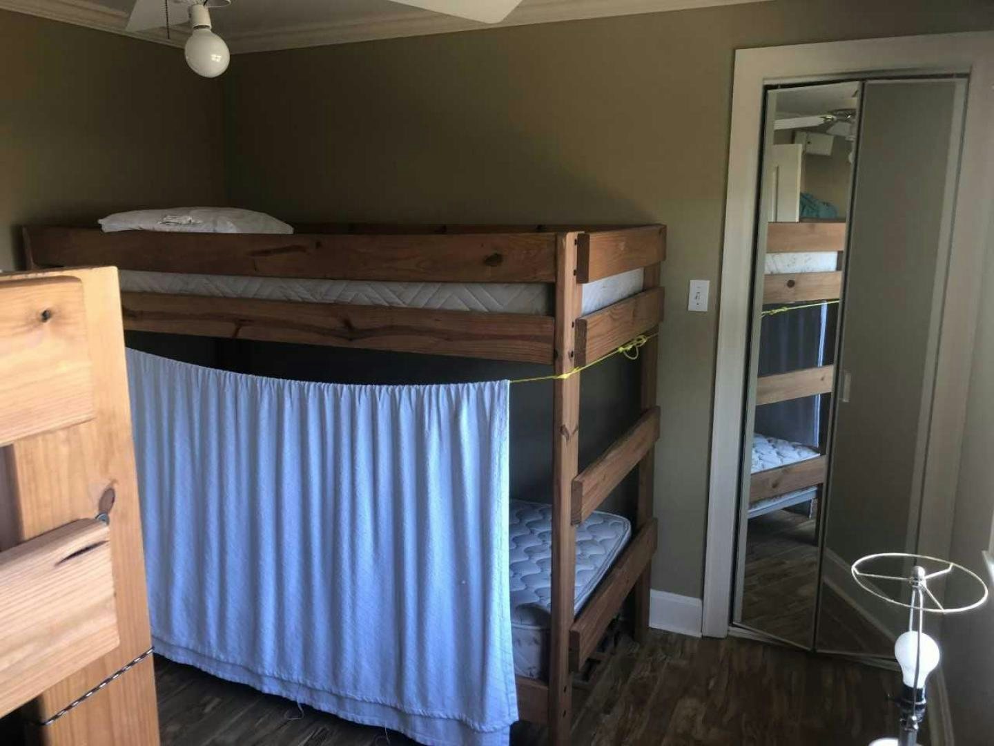 a bedroom with a bunk bed aboard LAKEHOUSE Yacht for Sale