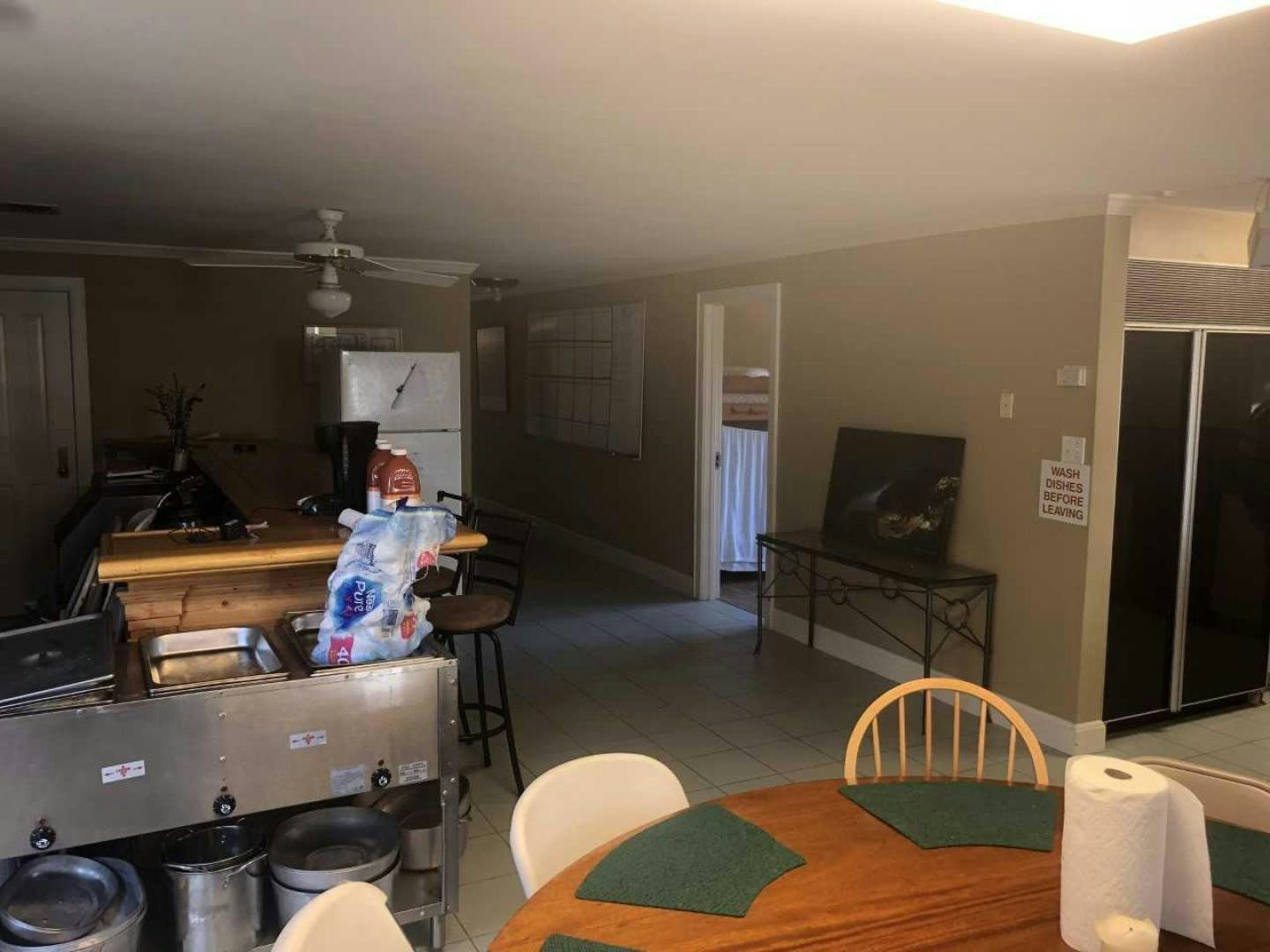 a person in a kitchen aboard LAKEHOUSE Yacht for Sale