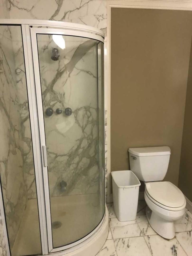 a shower with a glass door aboard LAKEHOUSE Yacht for Sale