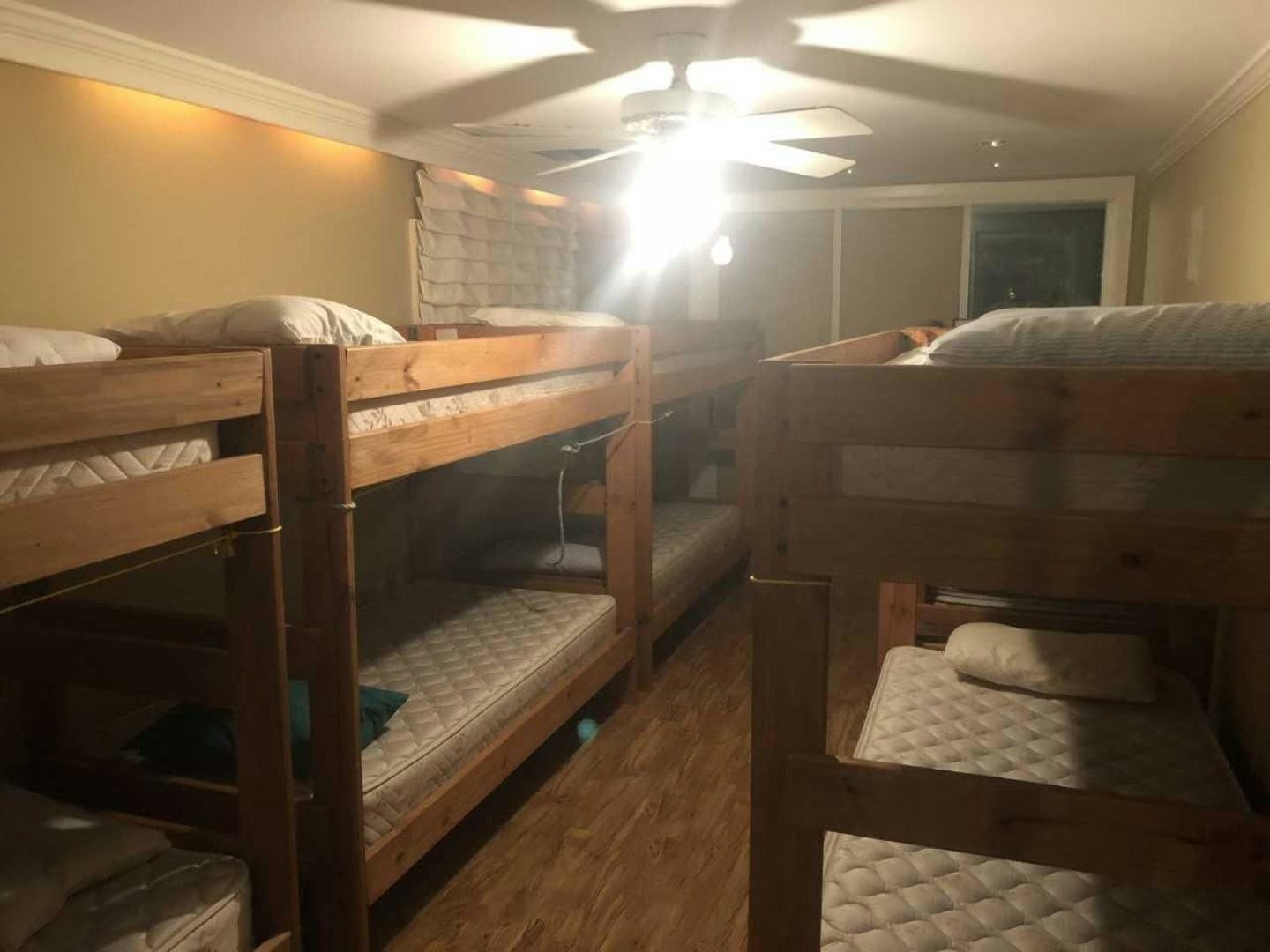 a room with bunk beds aboard LAKEHOUSE Yacht for Sale