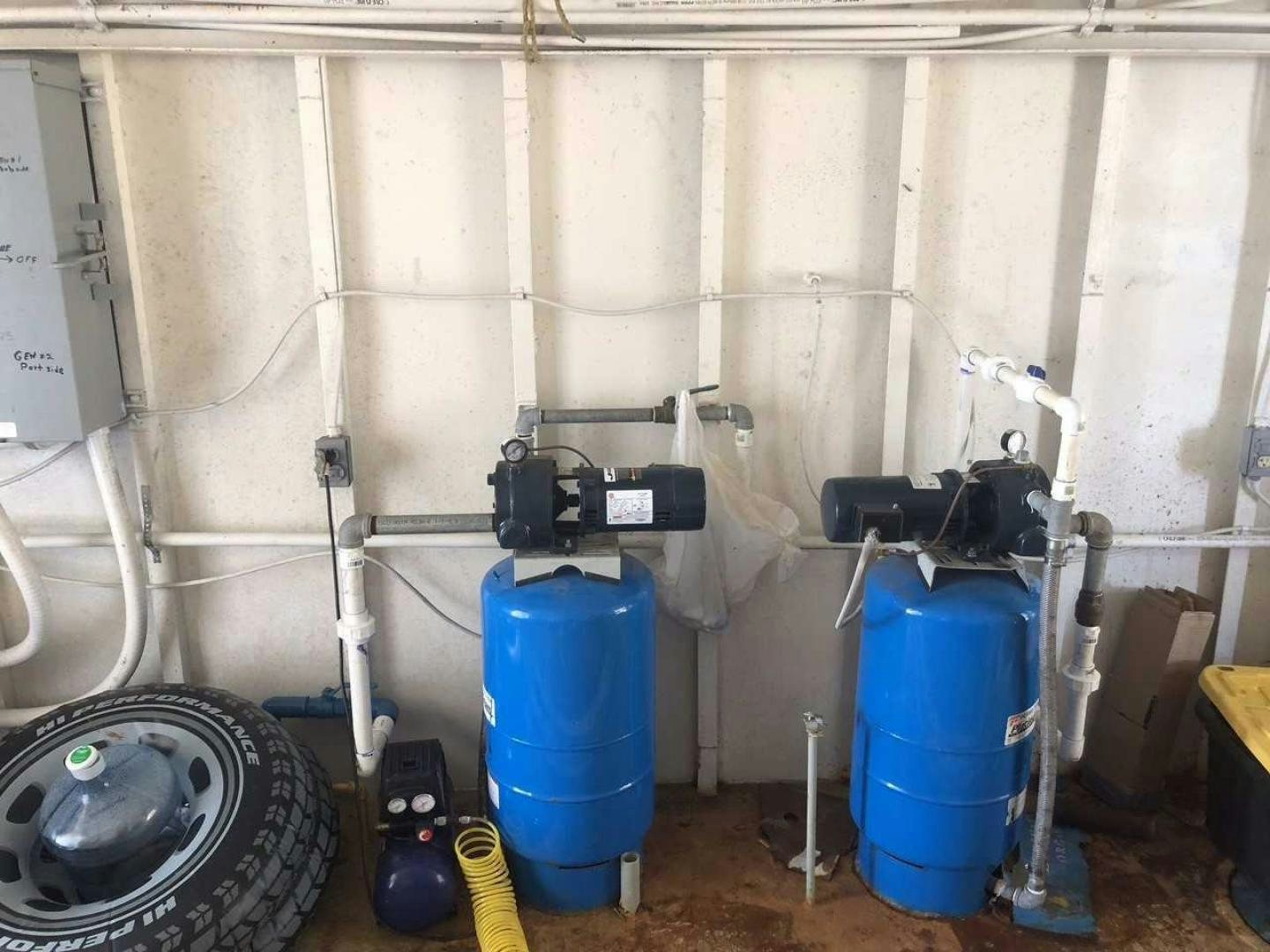 a room with a large blue cylinder aboard LAKEHOUSE Yacht for Sale