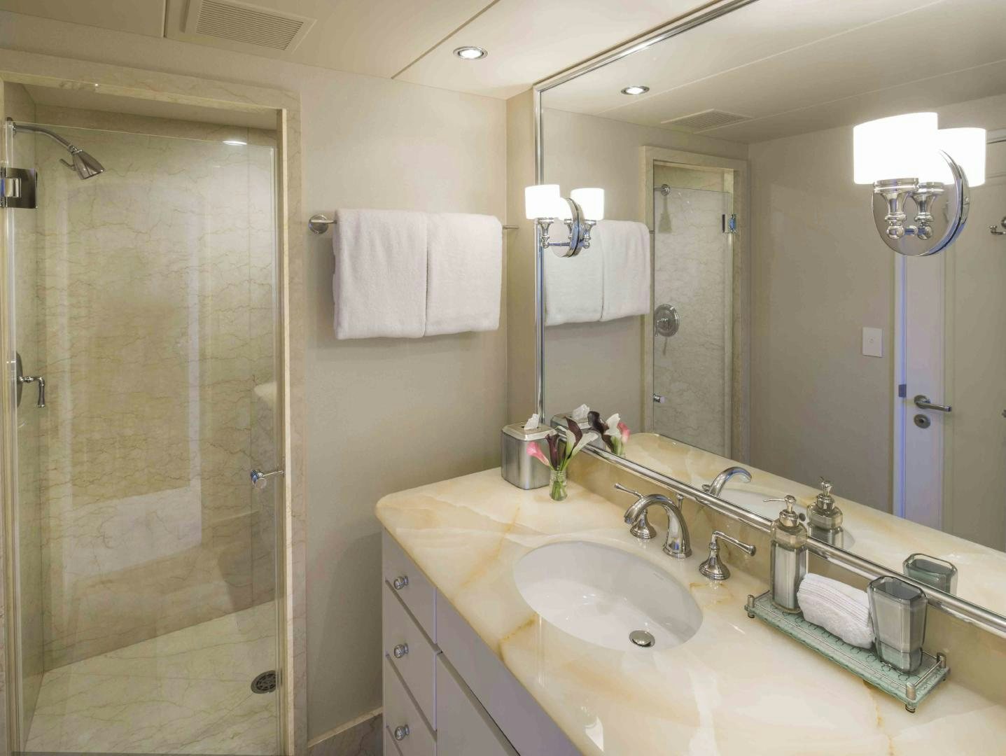 a bathroom with a sink and a shower aboard CHERISH Yacht for Sale