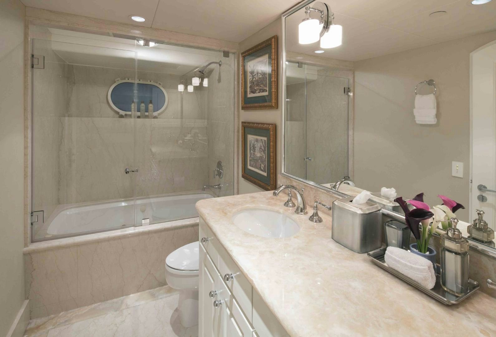 a bathroom with a sink toilet and bathtub aboard CHERISH Yacht for Sale