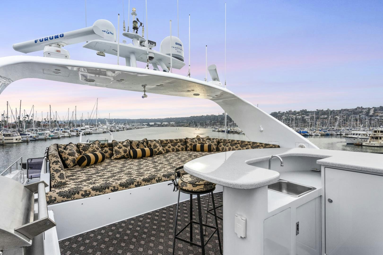 a large white boat with a large white structure in the background aboard ISABELLA Yacht for Sale