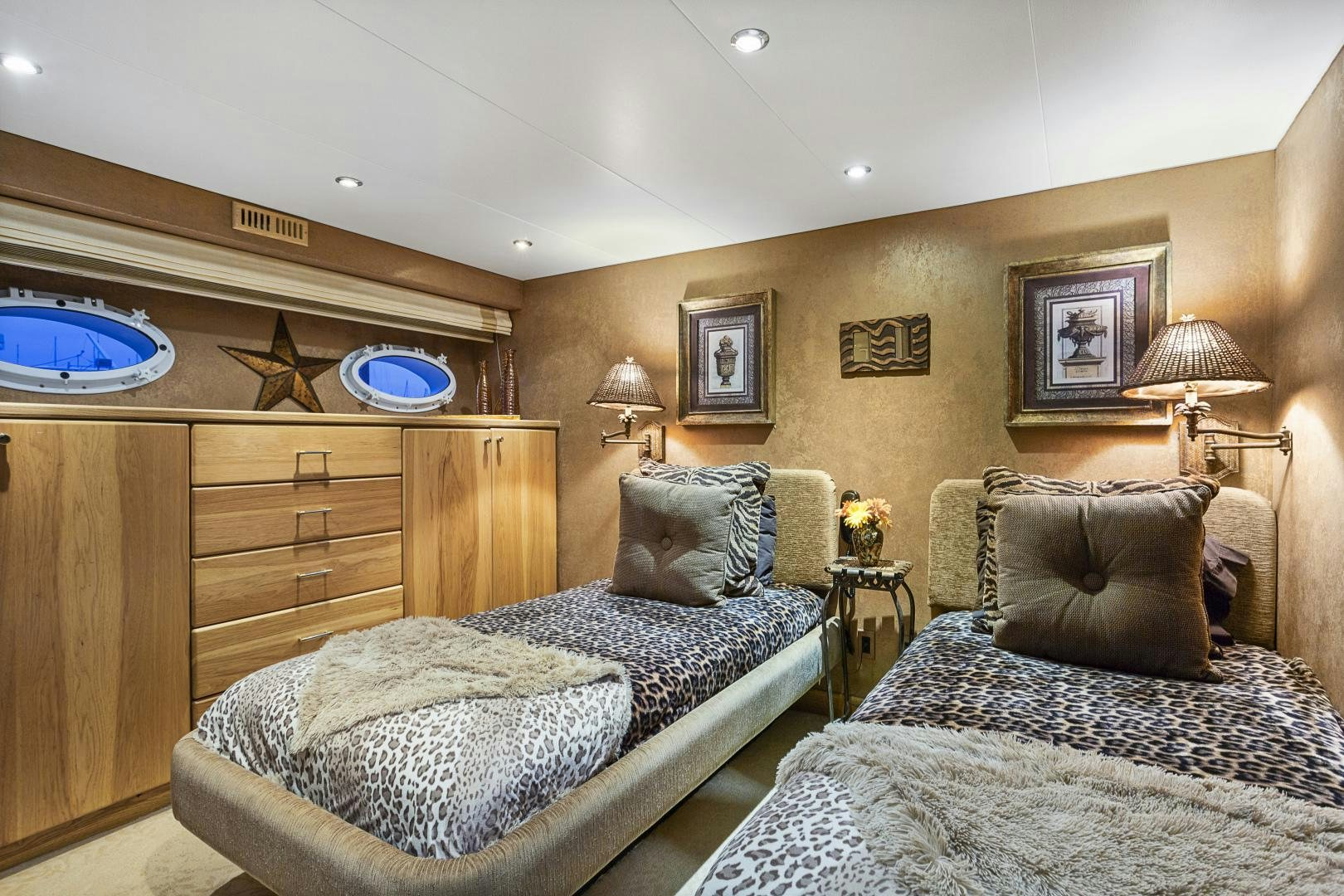 a bedroom with two beds aboard ISABELLA Yacht for Sale