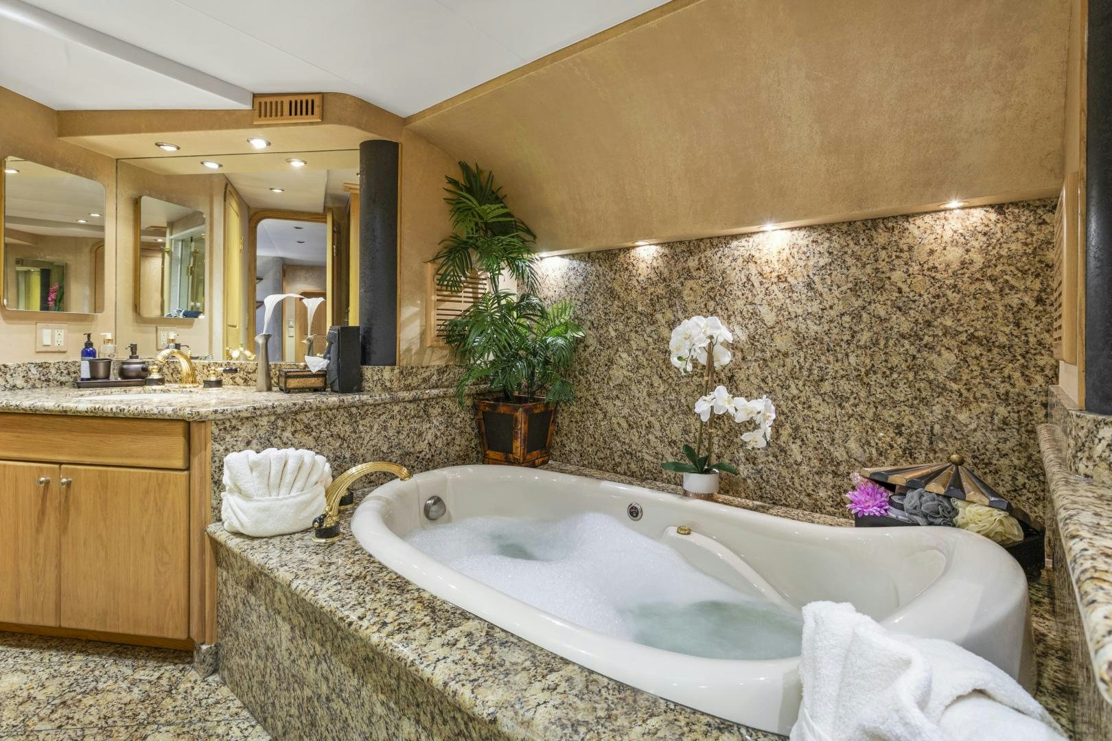 a bathroom with a large marble counter aboard ISABELLA Yacht for Sale