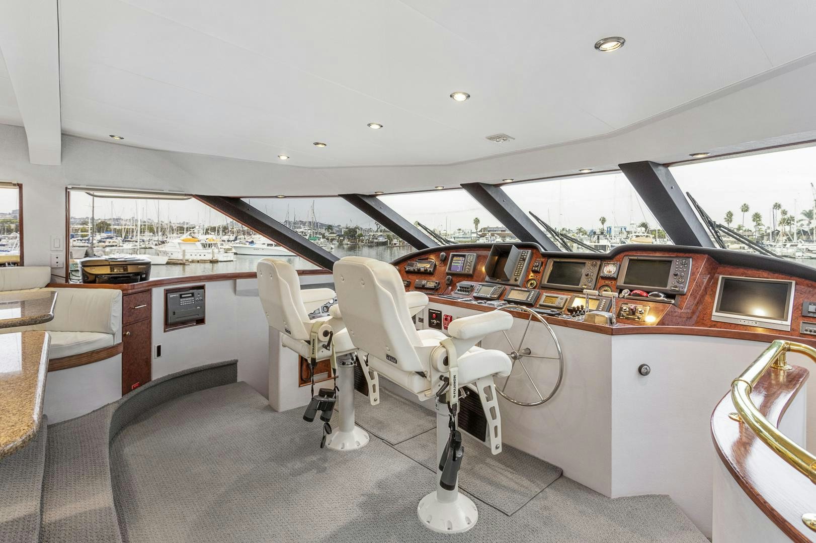 a room with a view of a city and a large window aboard ISABELLA Yacht for Sale