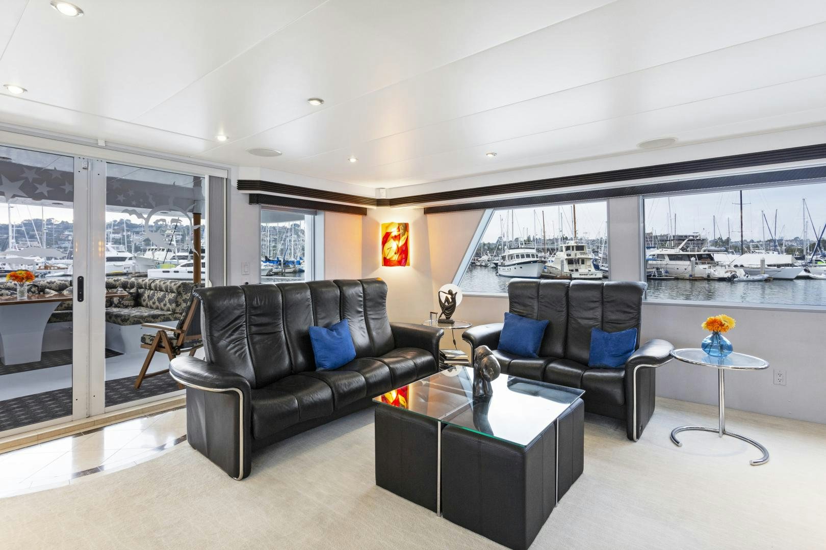 a living room with a large window aboard ISABELLA Yacht for Sale