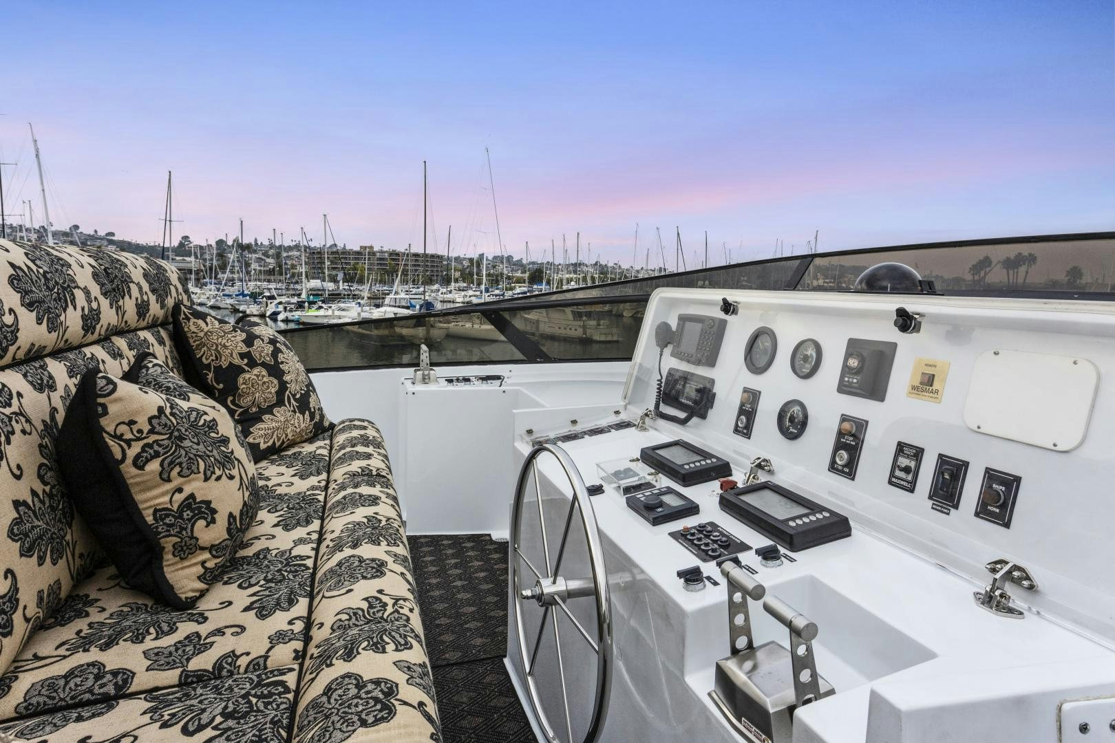 a military vehicle parked on a rooftop aboard ISABELLA Yacht for Sale