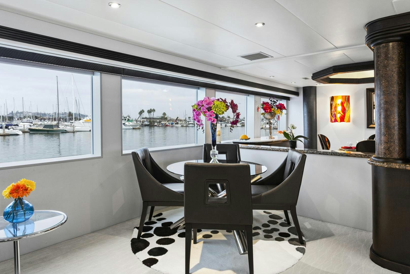 a dining table in a room aboard ISABELLA Yacht for Sale