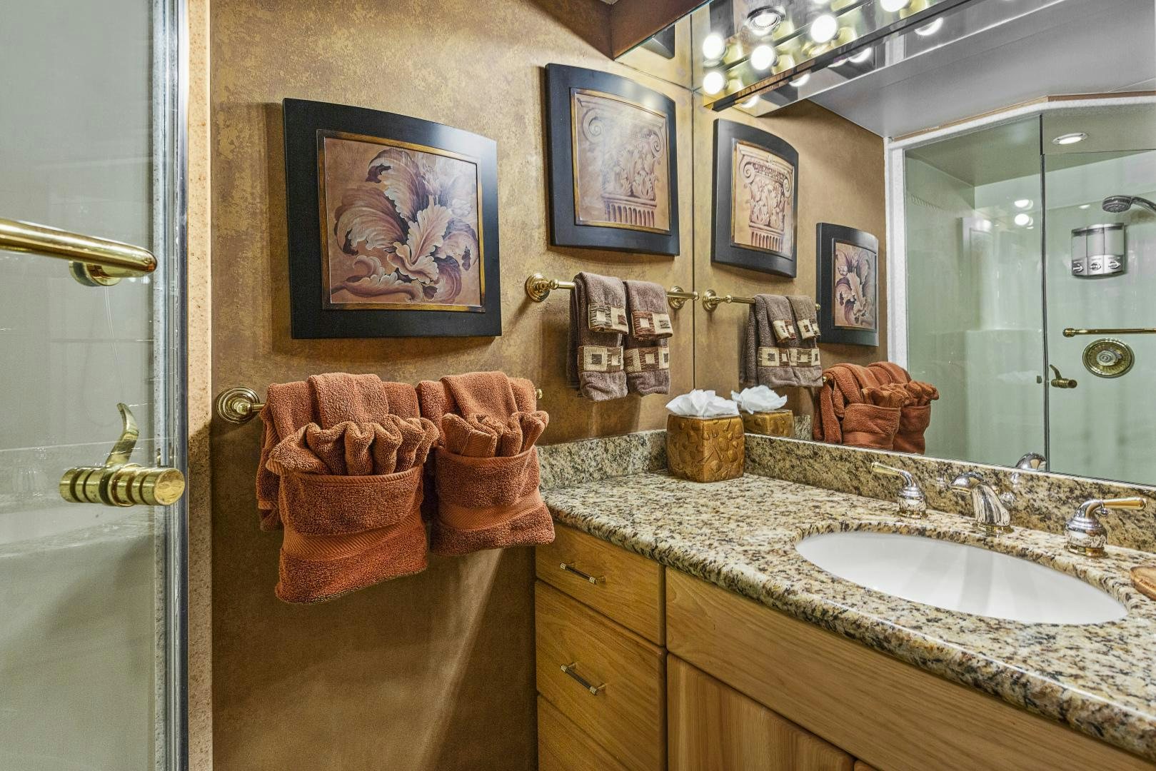 a bathroom with a sink and a mirror aboard ISABELLA Yacht for Sale