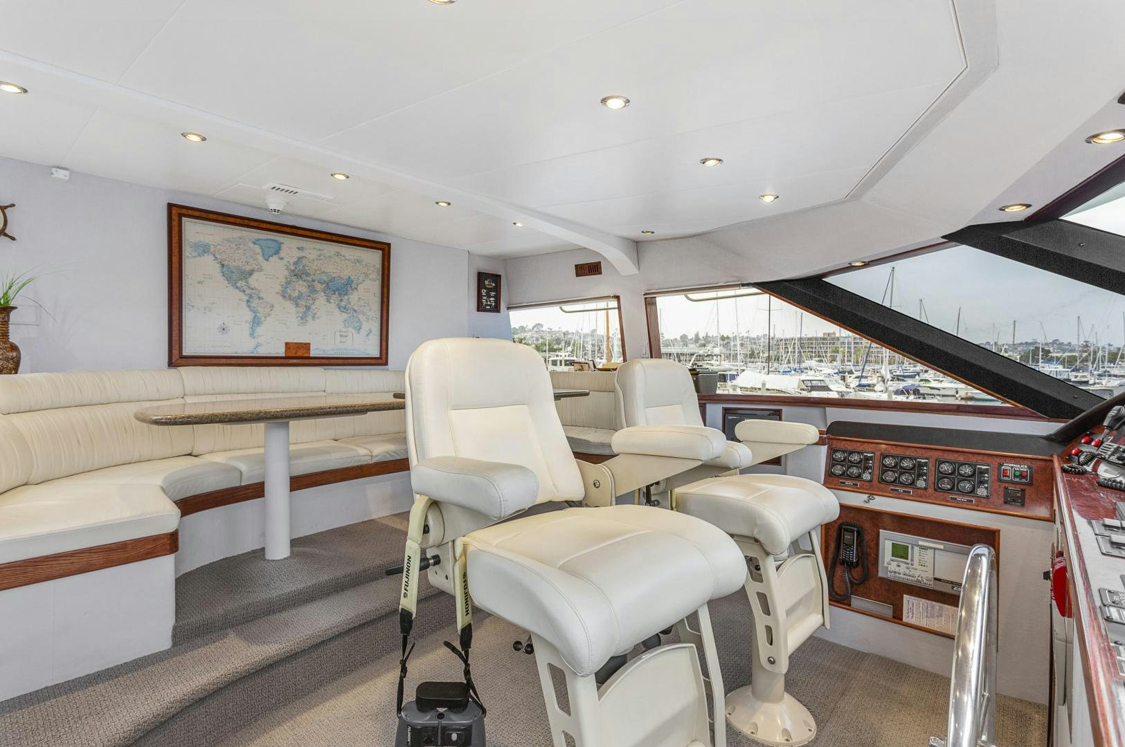 a room with a couch and a table and chairs aboard ISABELLA Yacht for Sale