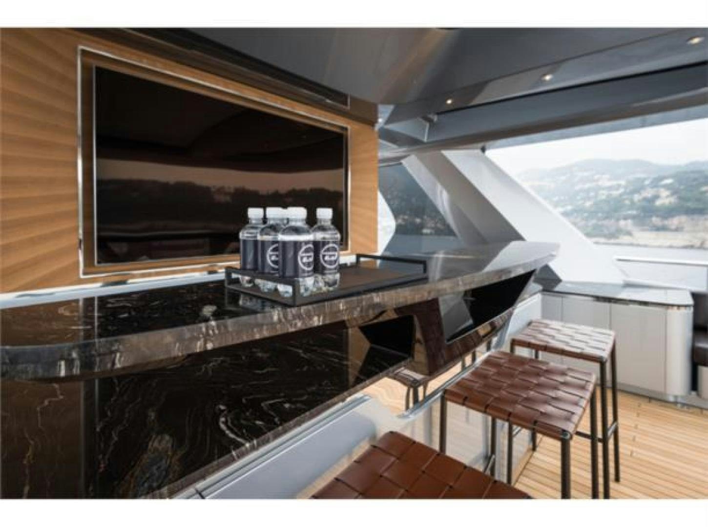 a coffee machine on a table aboard GTT 115 HYBRID Yacht for Sale
