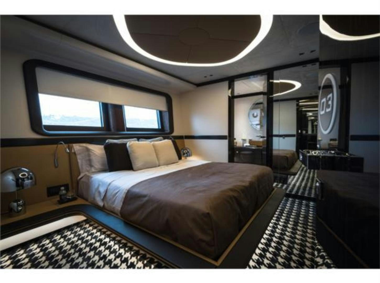 a room with a bed and a mirror aboard GTT 115 HYBRID Yacht for Sale
