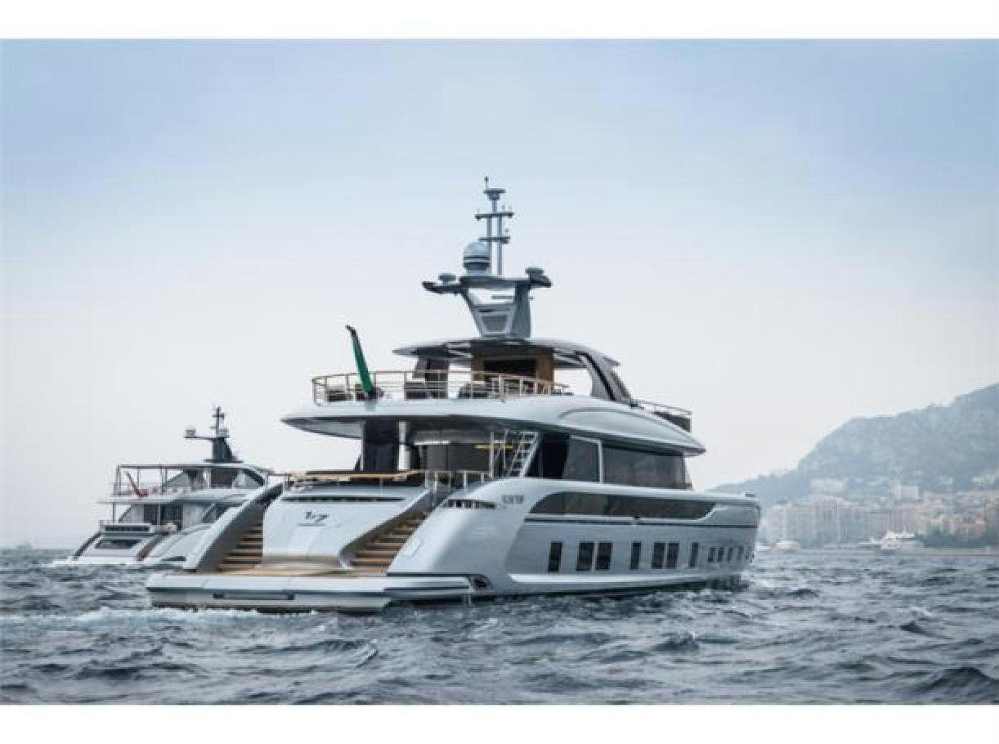 a boat in the water aboard GTT 115 HYBRID Yacht for Sale