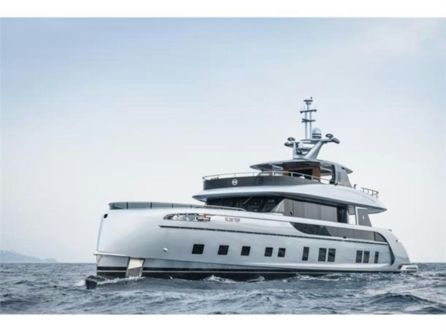 a large white boat in the water aboard GTT 115 HYBRID Yacht for Sale