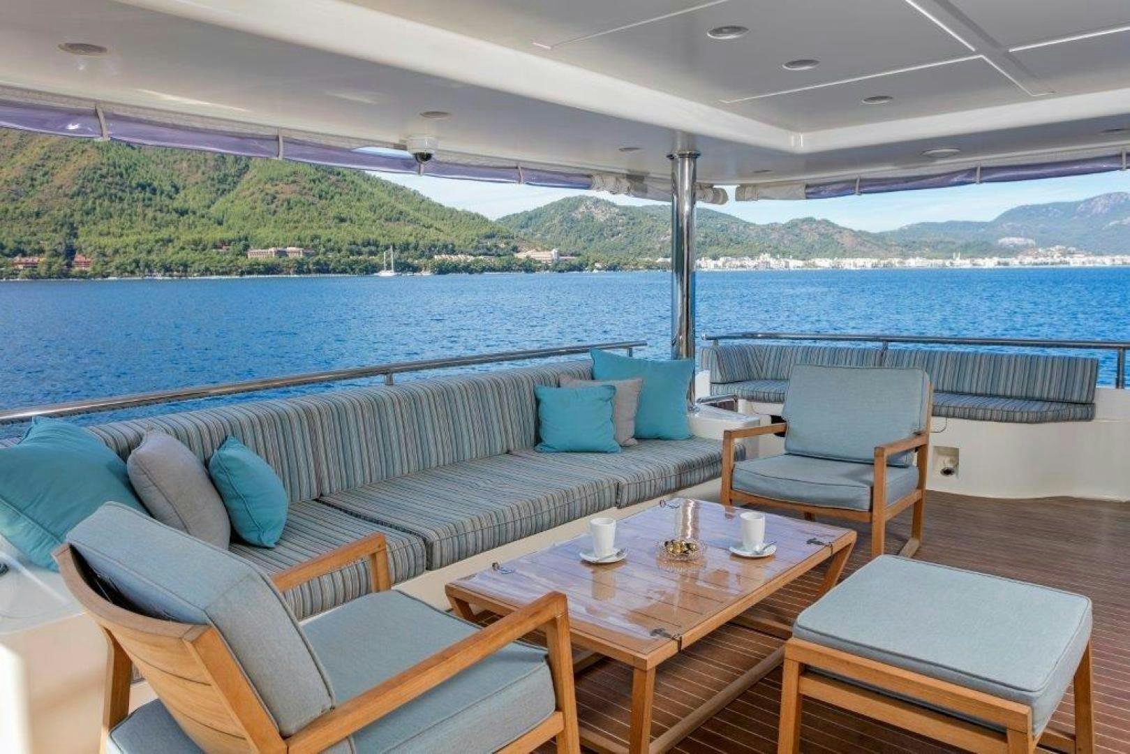 a living room with a large body of water aboard M&M Yacht for Sale