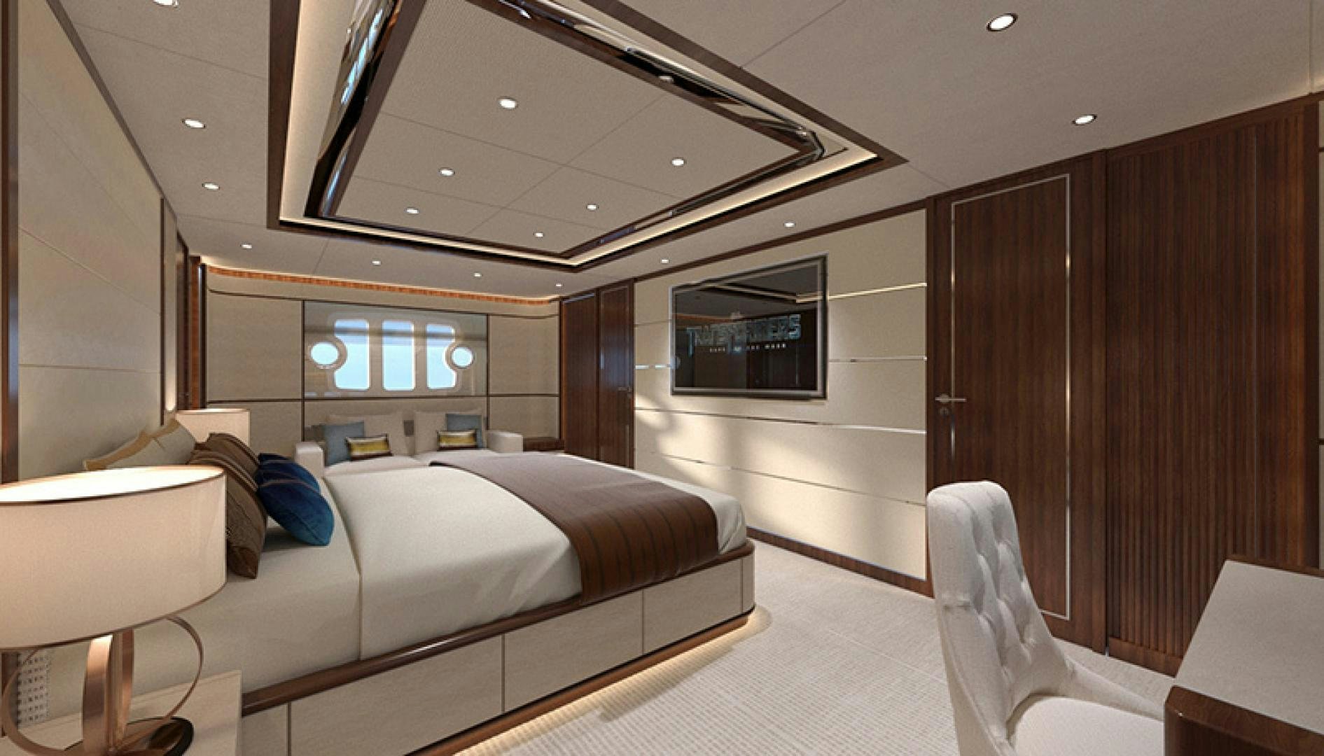a room with a bed and a chair aboard ASTERIA 112/04 Yacht for Sale