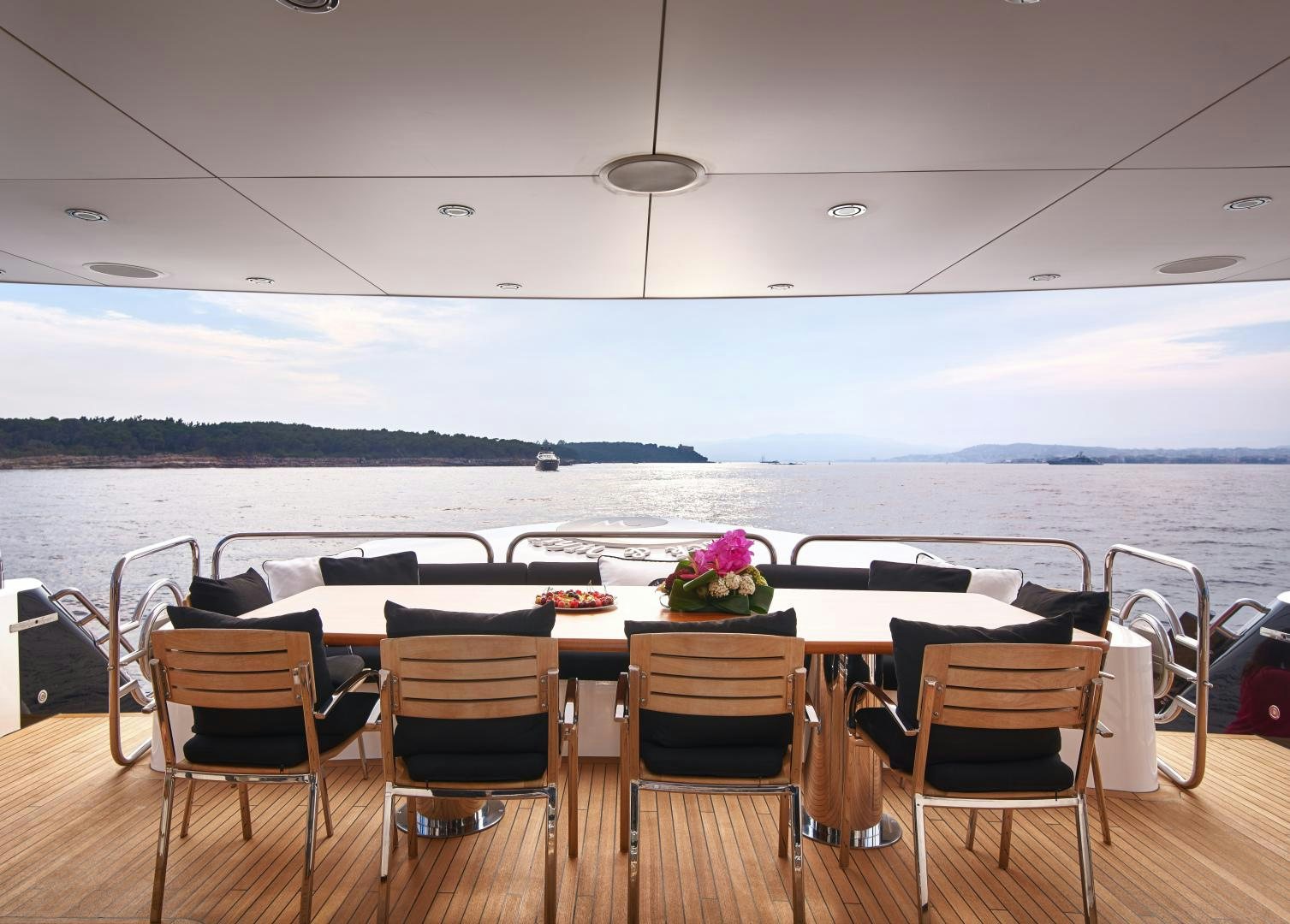 a table set for a dinner party aboard BLACK AND WHITE Yacht for Sale