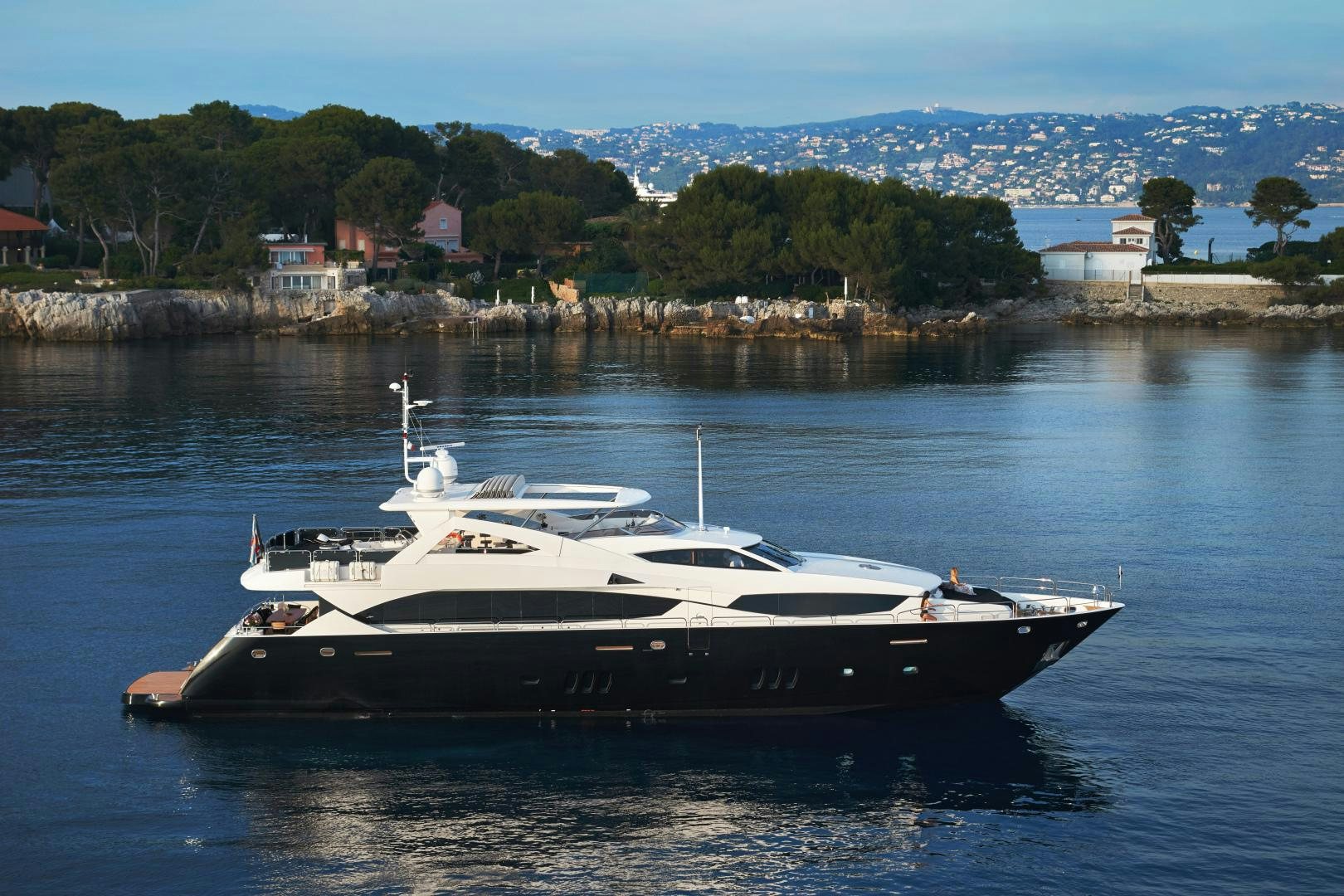a boat on the water aboard BLACK AND WHITE Yacht for Sale