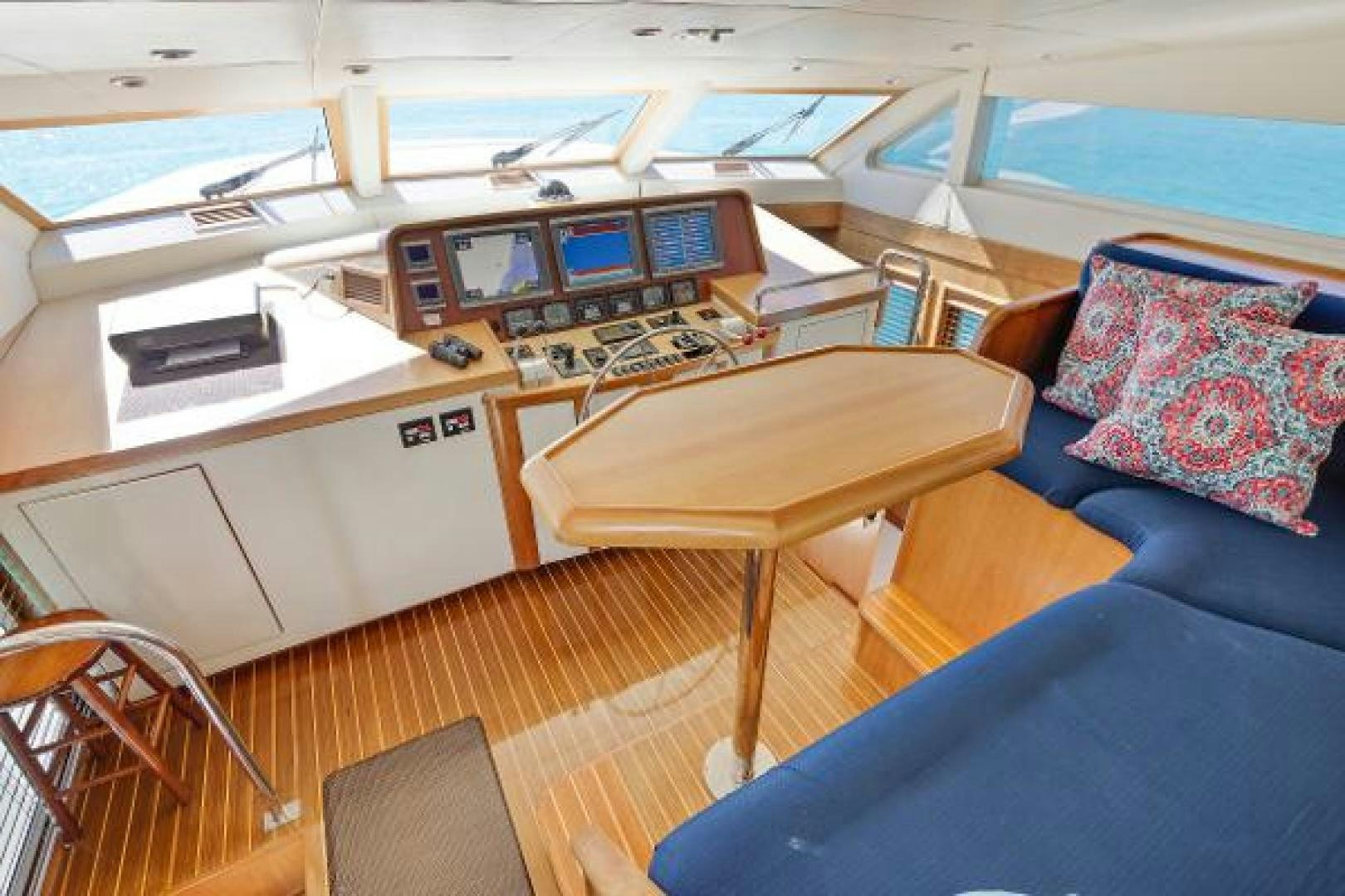 a room with a desk and a couch aboard IL CAPO Yacht for Sale