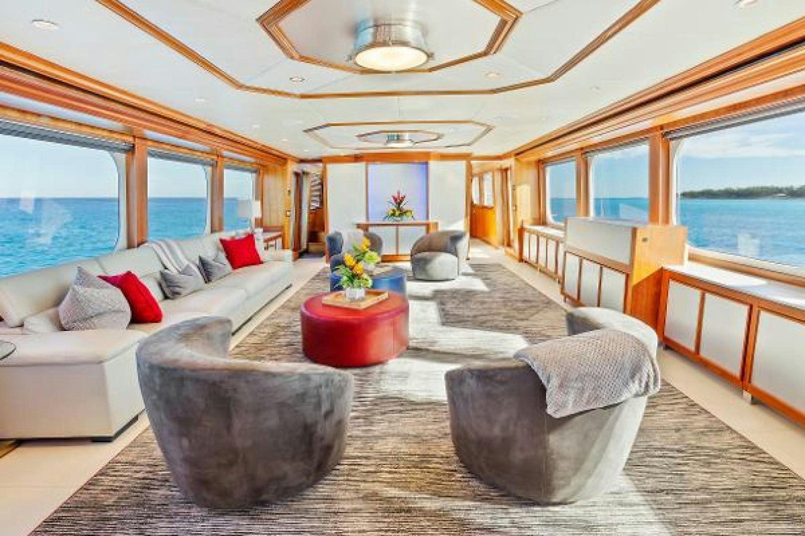a living room with a large open window aboard IL CAPO Yacht for Sale