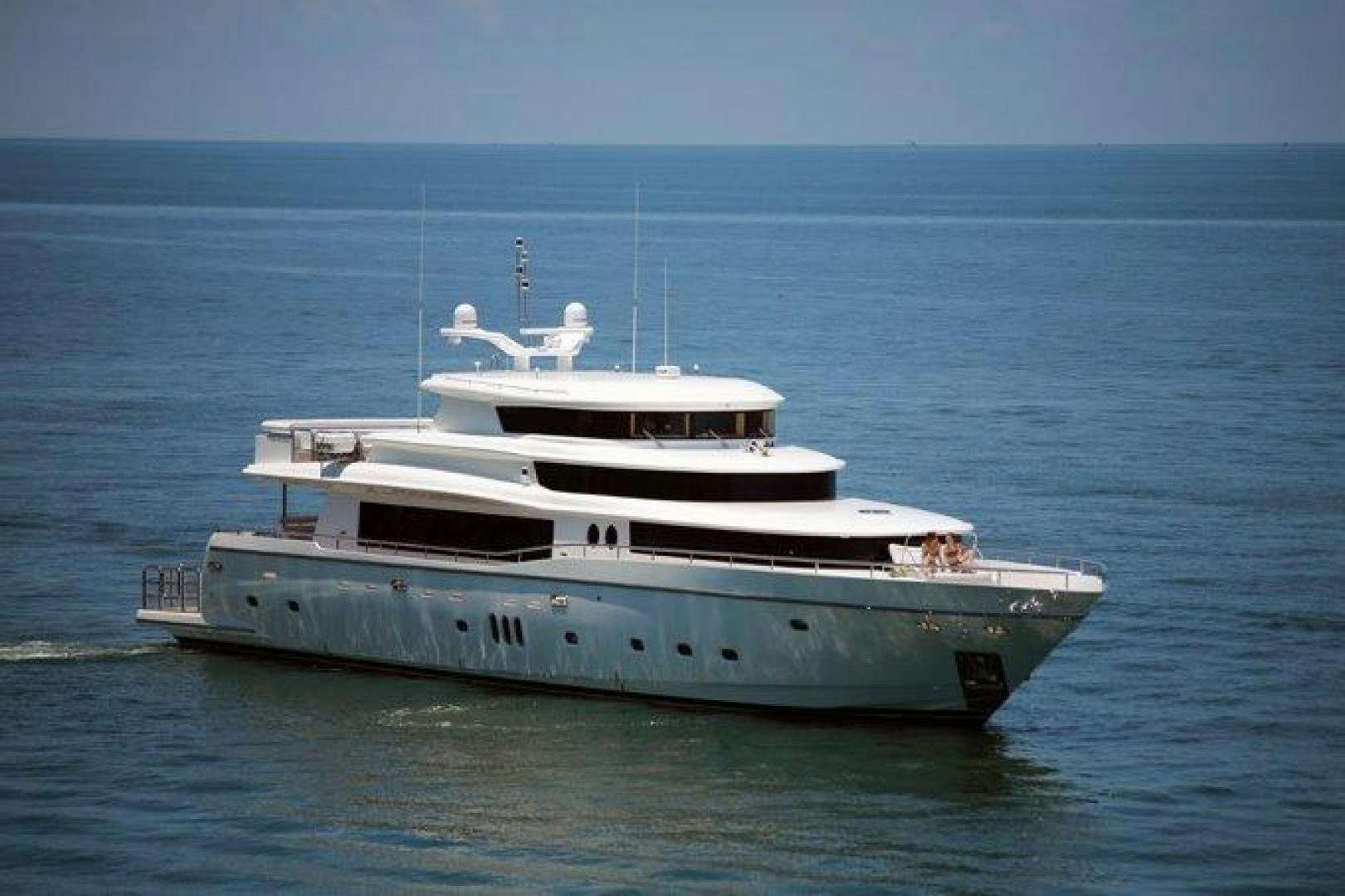 a boat in the water aboard JOHNSON 110 SKYLOUNGE Yacht for Sale