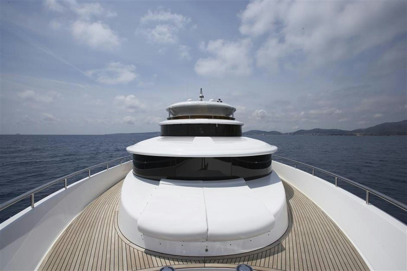 a boat on a body of water aboard JOHNSON 110 FLYBRIDGE Yacht for Sale