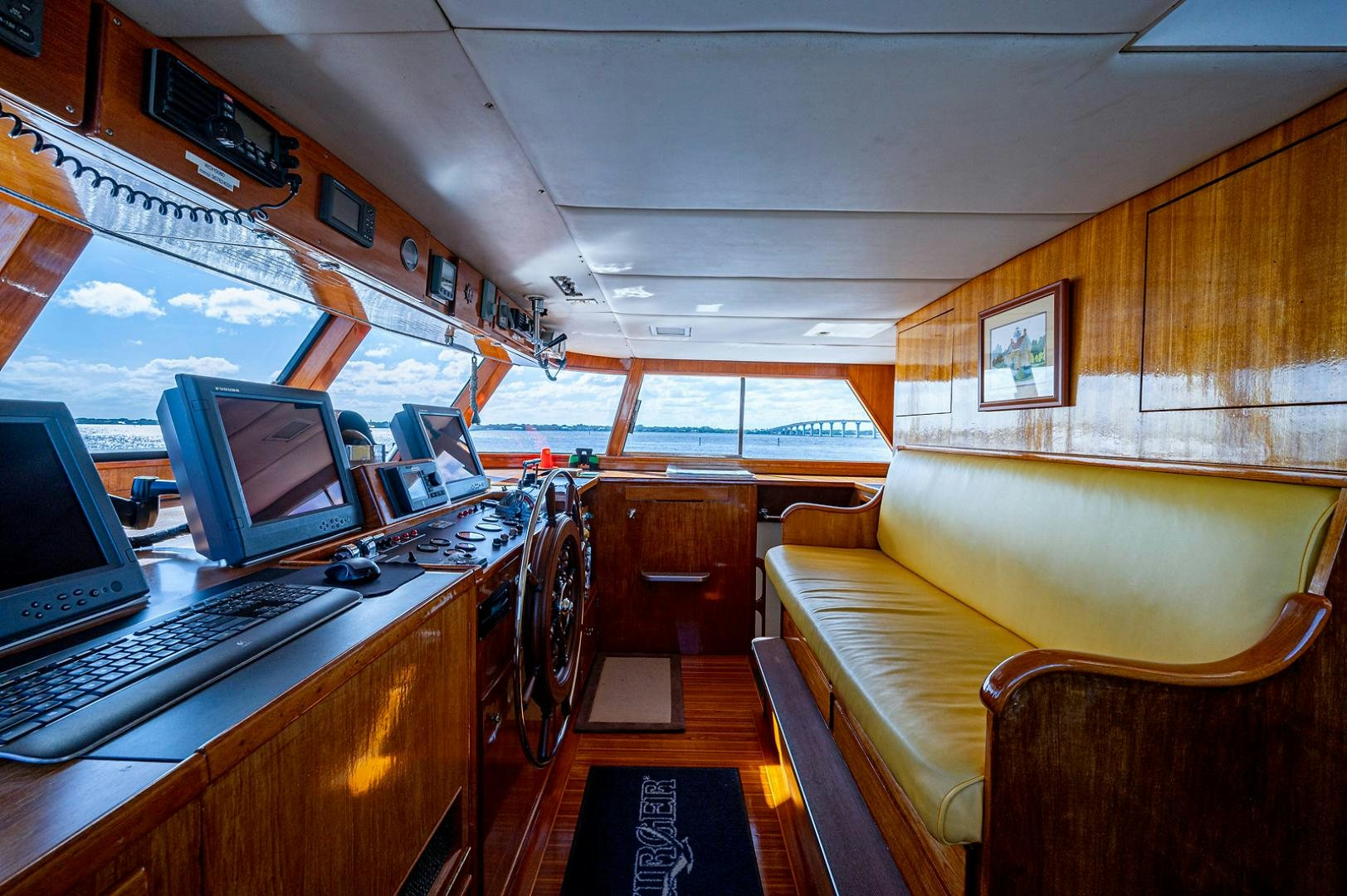 a train with a desk and a computer aboard CHANTICLEER Yacht for Sale