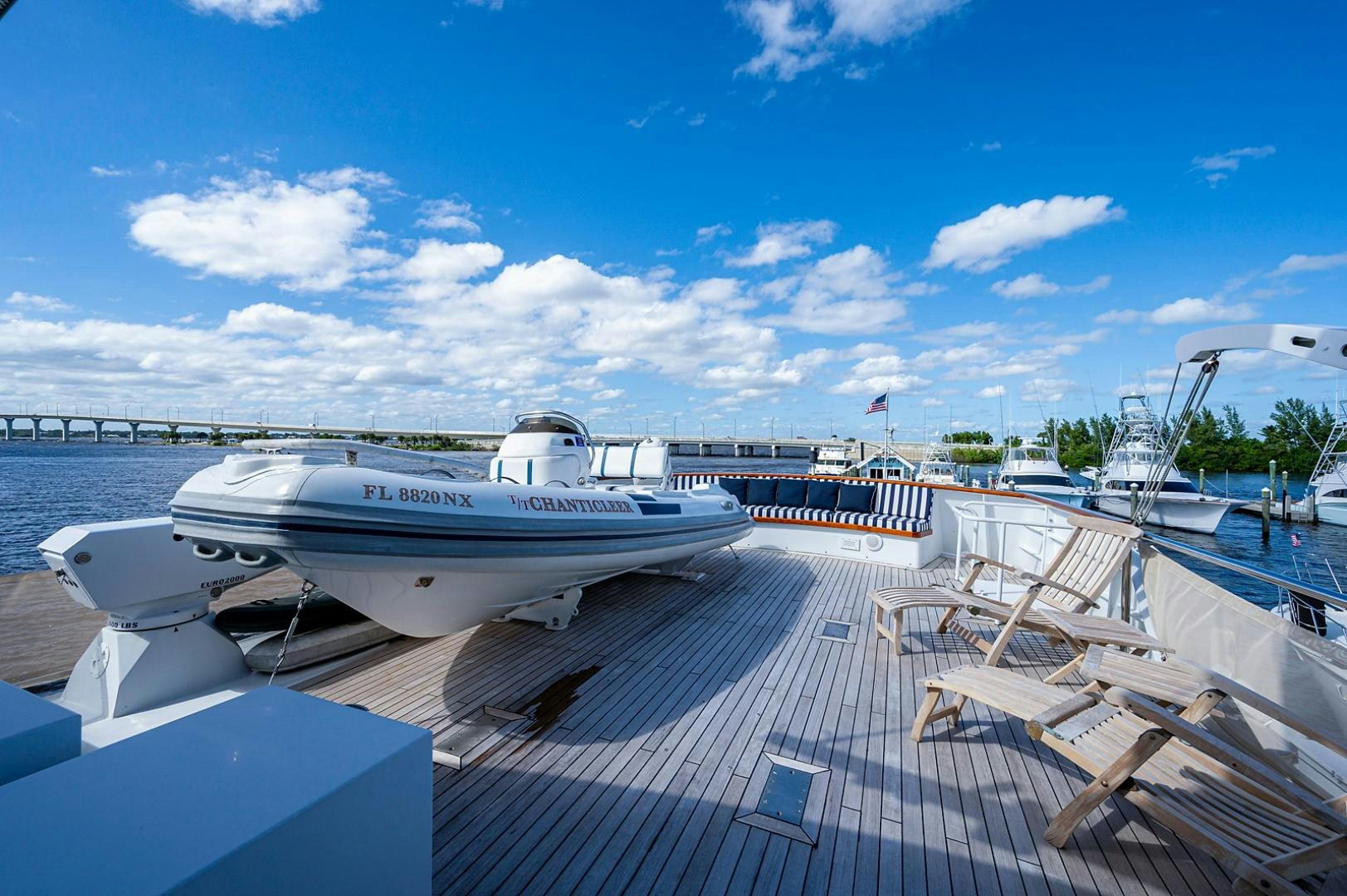a boat docked at a pier aboard CHANTICLEER Yacht for Sale