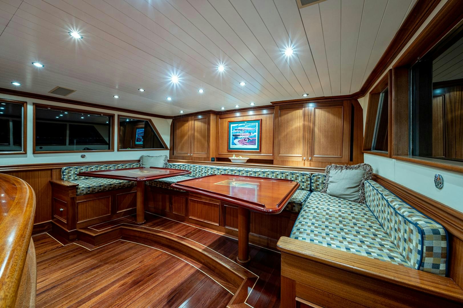 a room with a couch and a table aboard CHANTICLEER Yacht for Sale