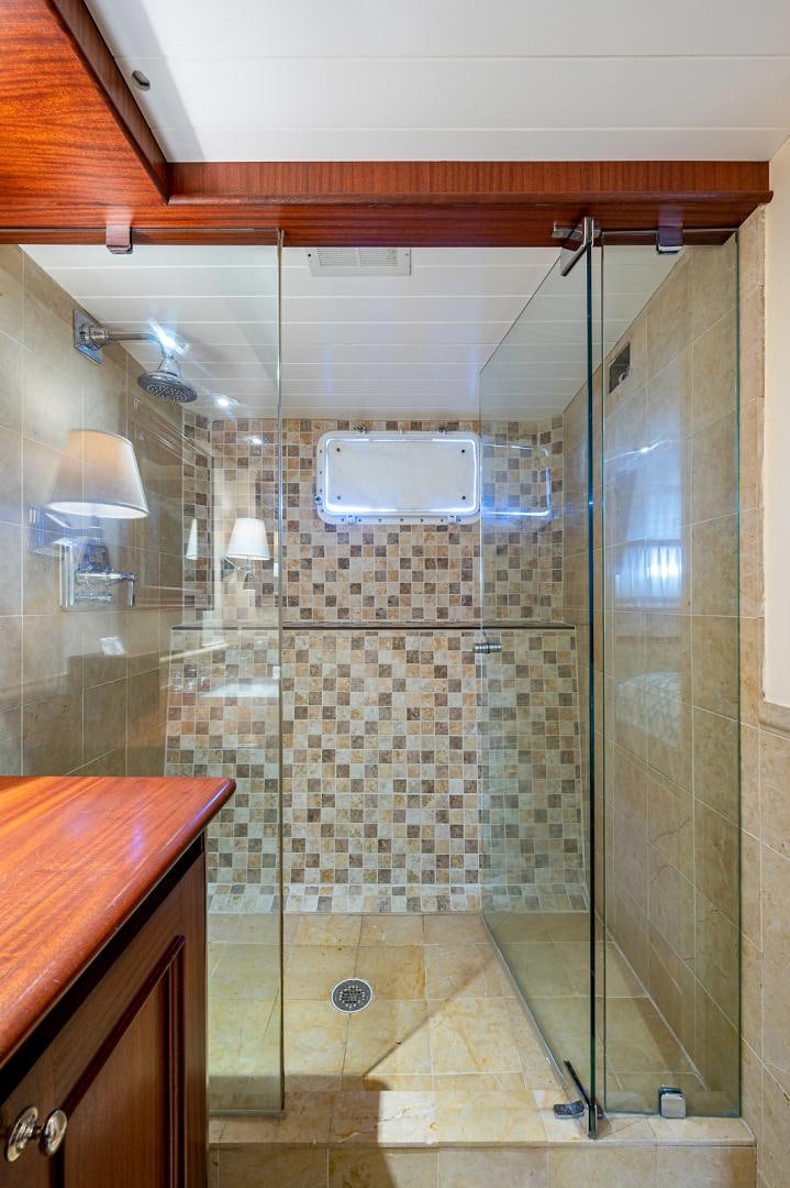 a shower with glass walls aboard CHANTICLEER Yacht for Sale