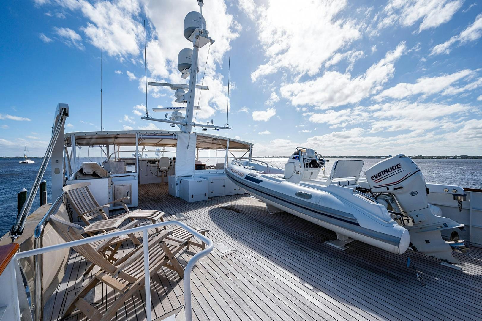 a boat docked at a pier aboard CHANTICLEER Yacht for Sale