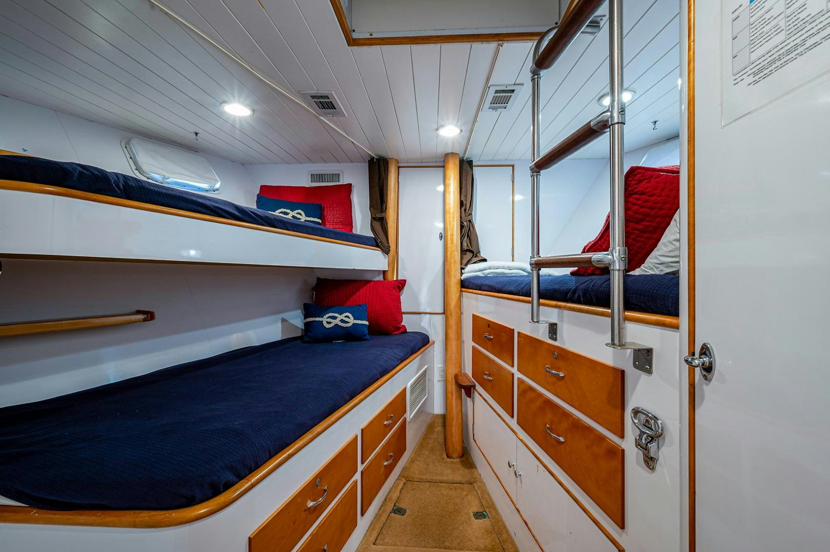 a room with bunk beds aboard CHANTICLEER Yacht for Sale