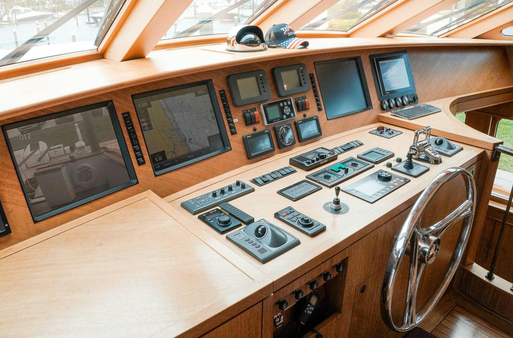 a table with many electronics on it aboard RAISING DOUGH Yacht for Sale