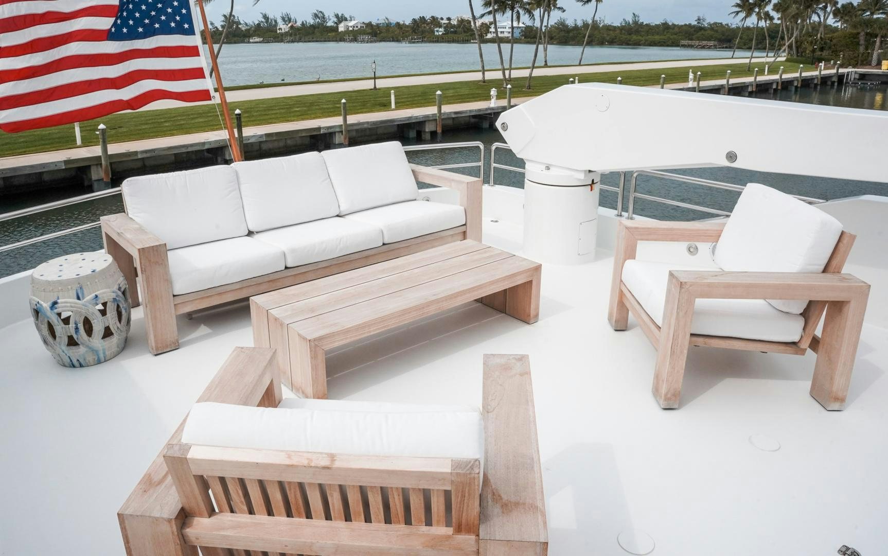 a group of wooden benches aboard RAISING DOUGH Yacht for Sale