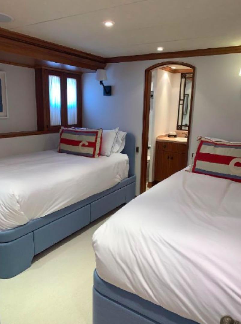 a couple of beds in a room aboard RAISING DOUGH Yacht for Sale