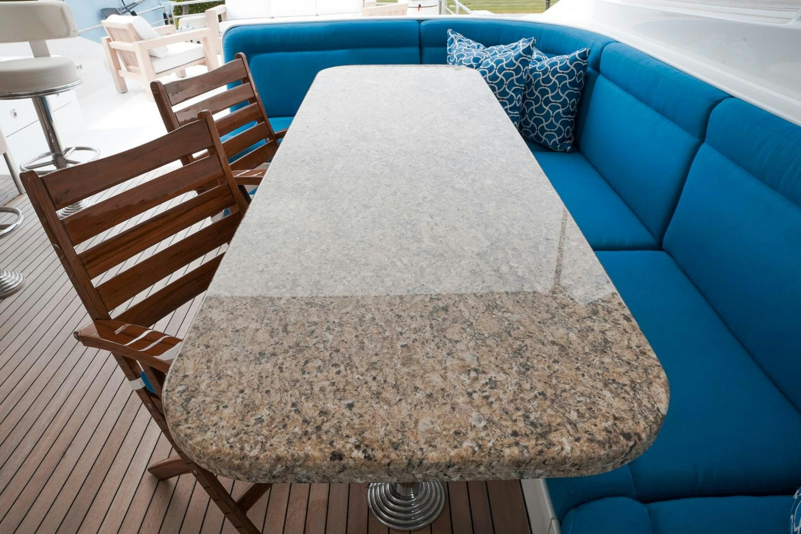 a chair on a table aboard RAISING DOUGH Yacht for Sale