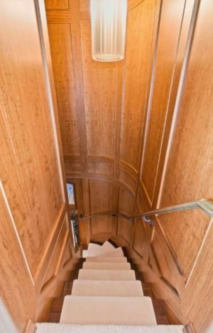 a staircase leading up to a building aboard RAISING DOUGH Yacht for Sale