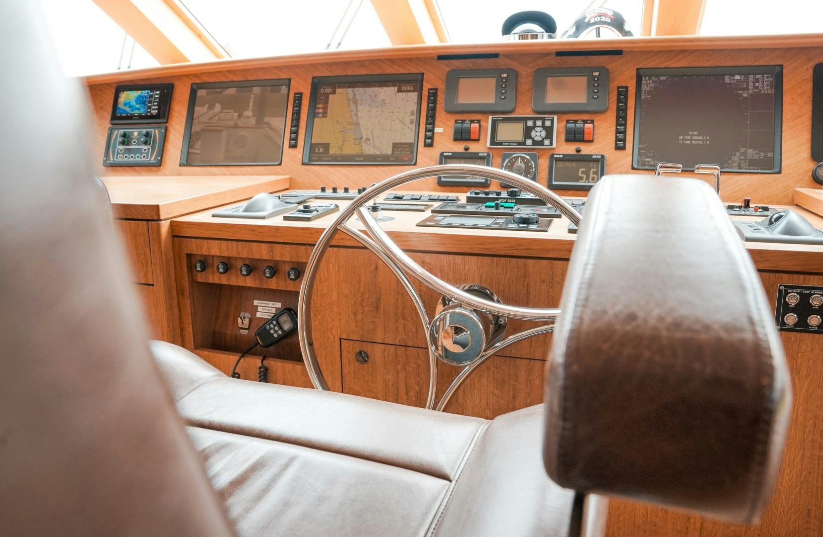 a guitar on a couch aboard RAISING DOUGH Yacht for Sale