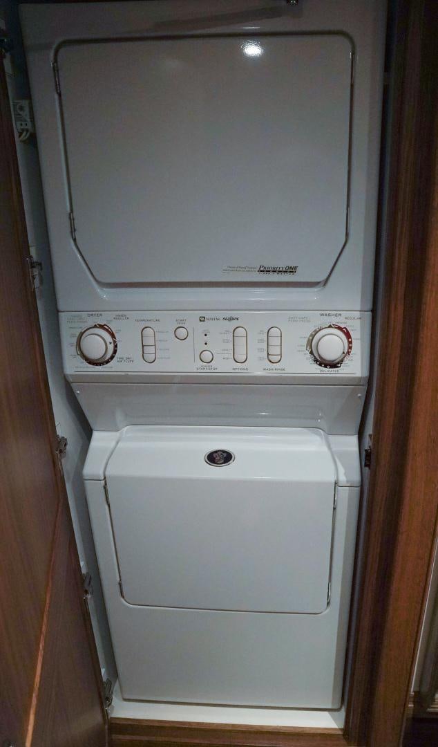 a white machine with a vent aboard RAISING DOUGH Yacht for Sale