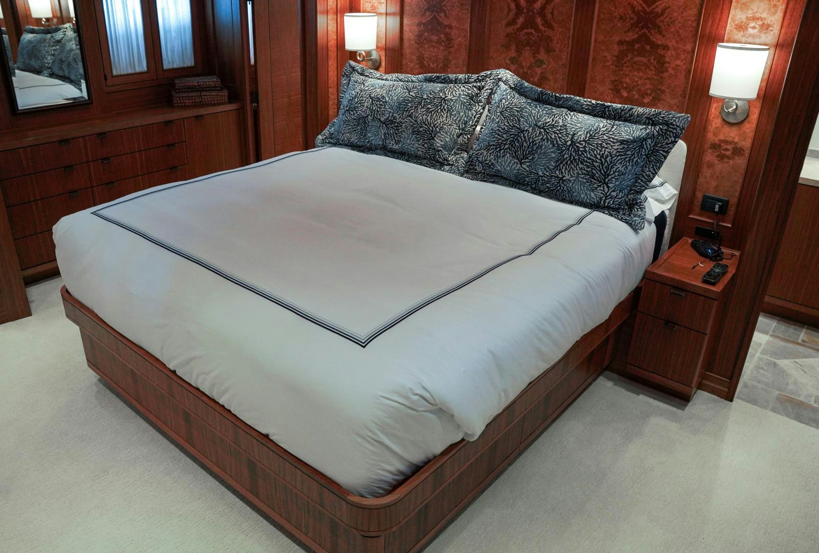 a bed with a white sheet aboard RAISING DOUGH Yacht for Sale