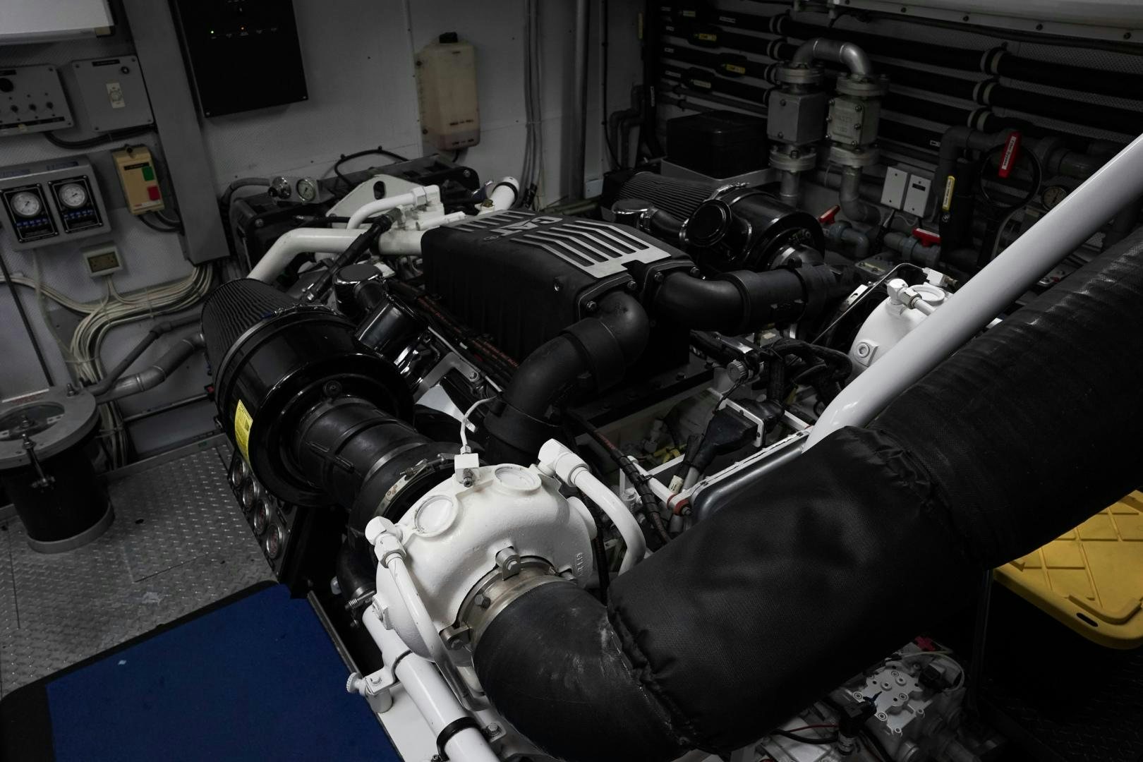 a machine with a black hood aboard RAISING DOUGH Yacht for Sale