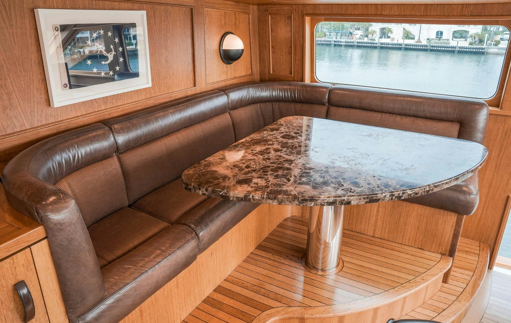 a leather couch in a room aboard RAISING DOUGH Yacht for Sale