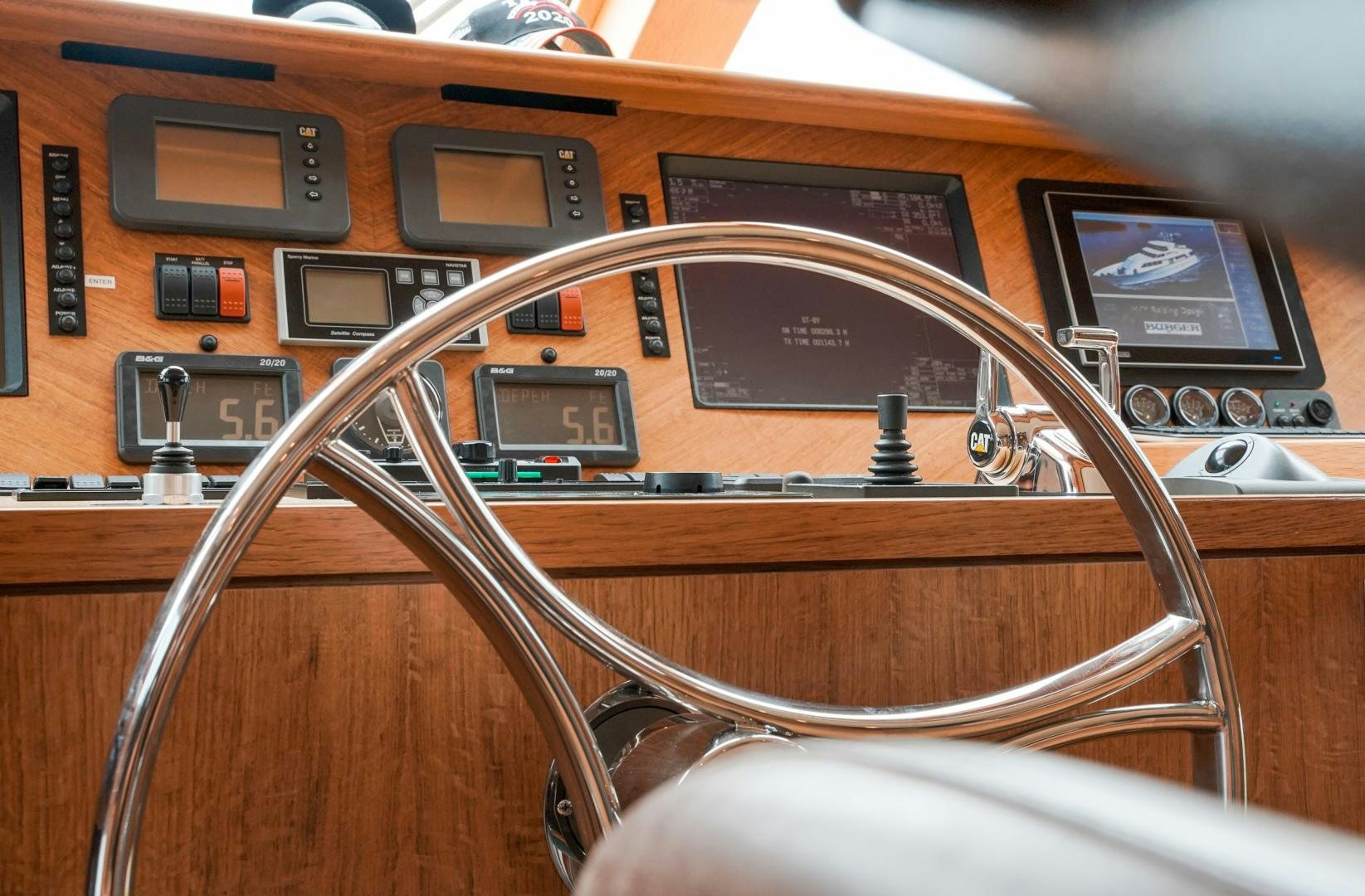 a brown and black object with a black handle aboard RAISING DOUGH Yacht for Sale