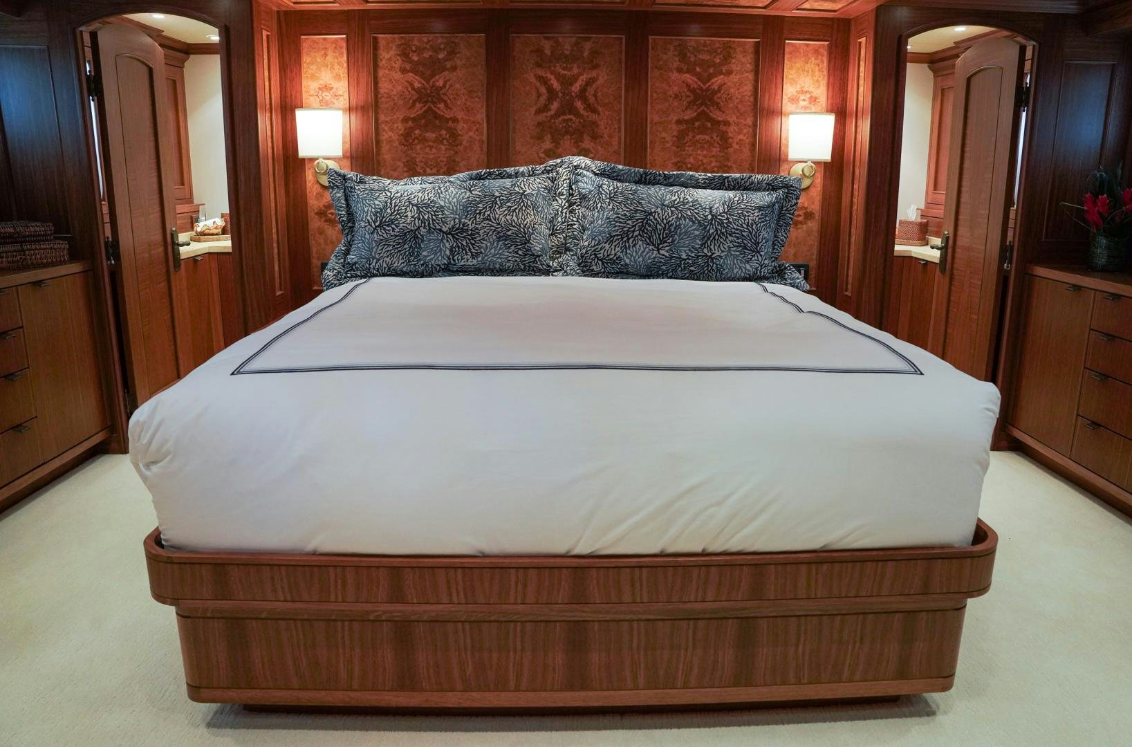 a bed with a white sheet aboard RAISING DOUGH Yacht for Sale