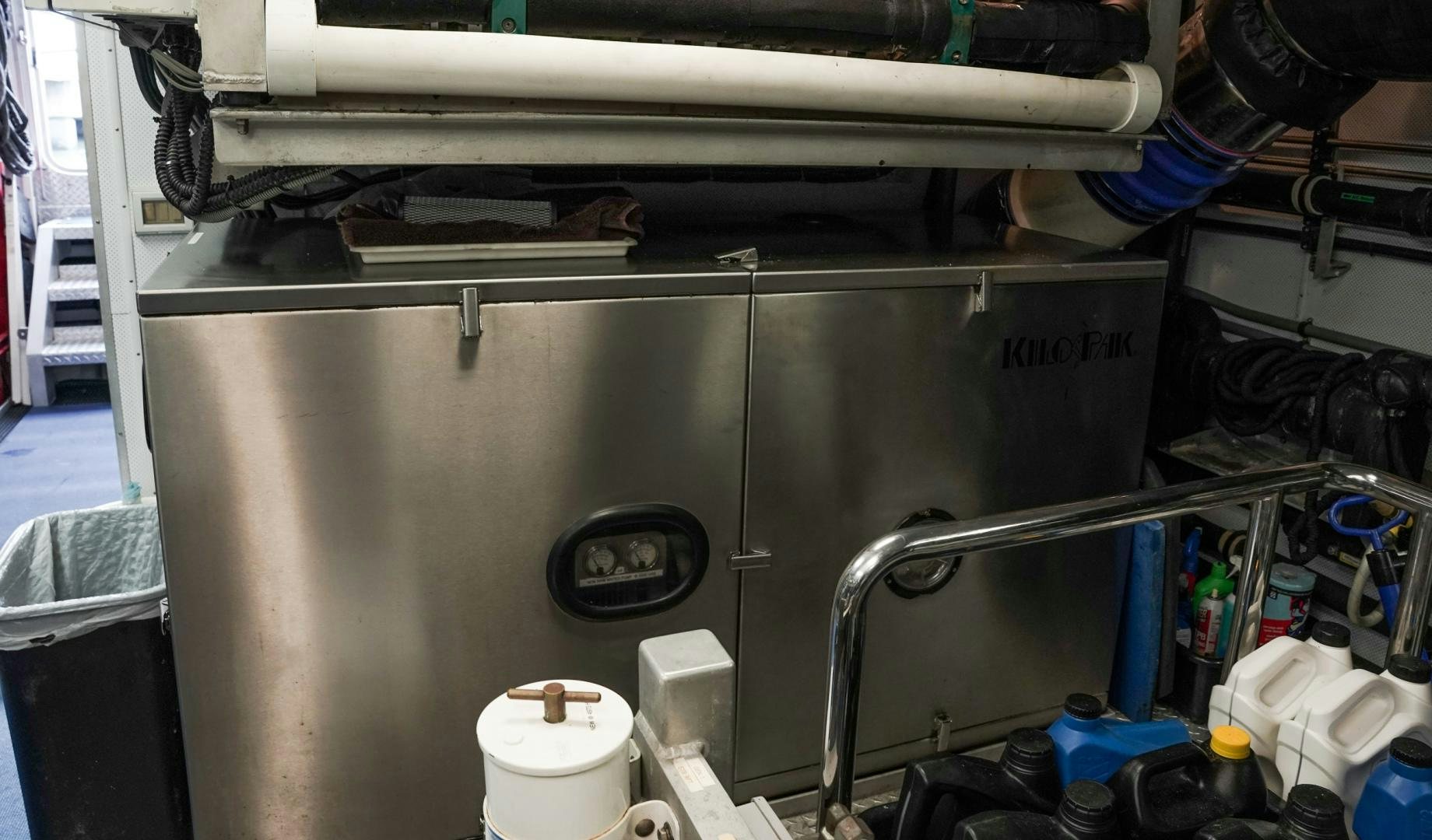 a machine with a metal frame aboard RAISING DOUGH Yacht for Sale