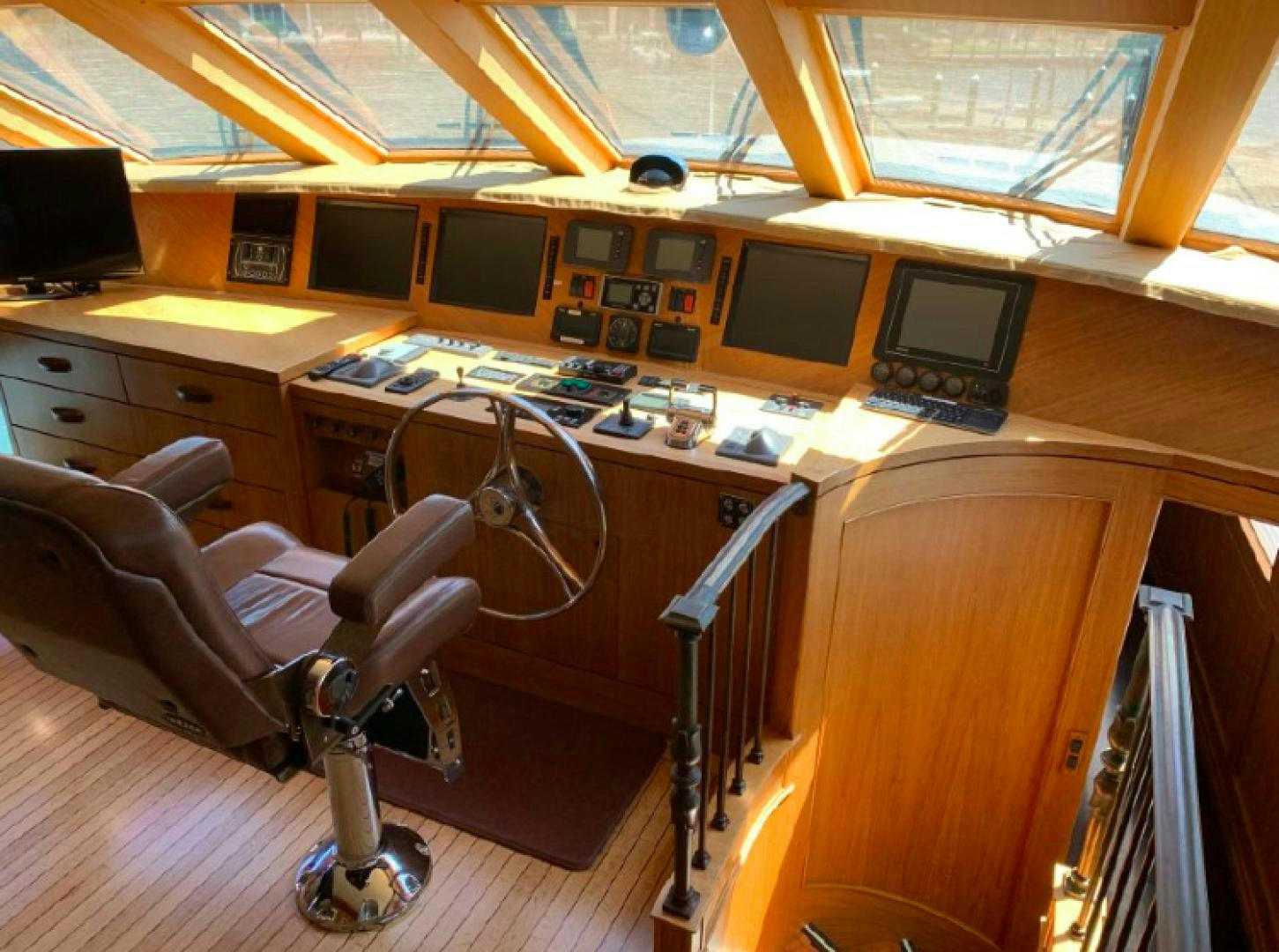 a chair in a room aboard RAISING DOUGH Yacht for Sale